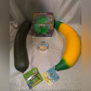 Mini Squishy Dumpling, Kitty squishy, banana & pickle package has 1 of each!